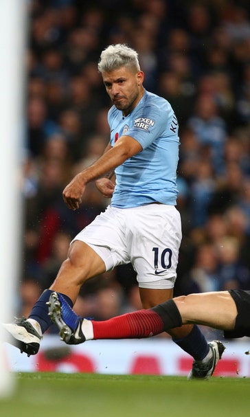 Man City goes 12 points clear of United with 3-1 derby win